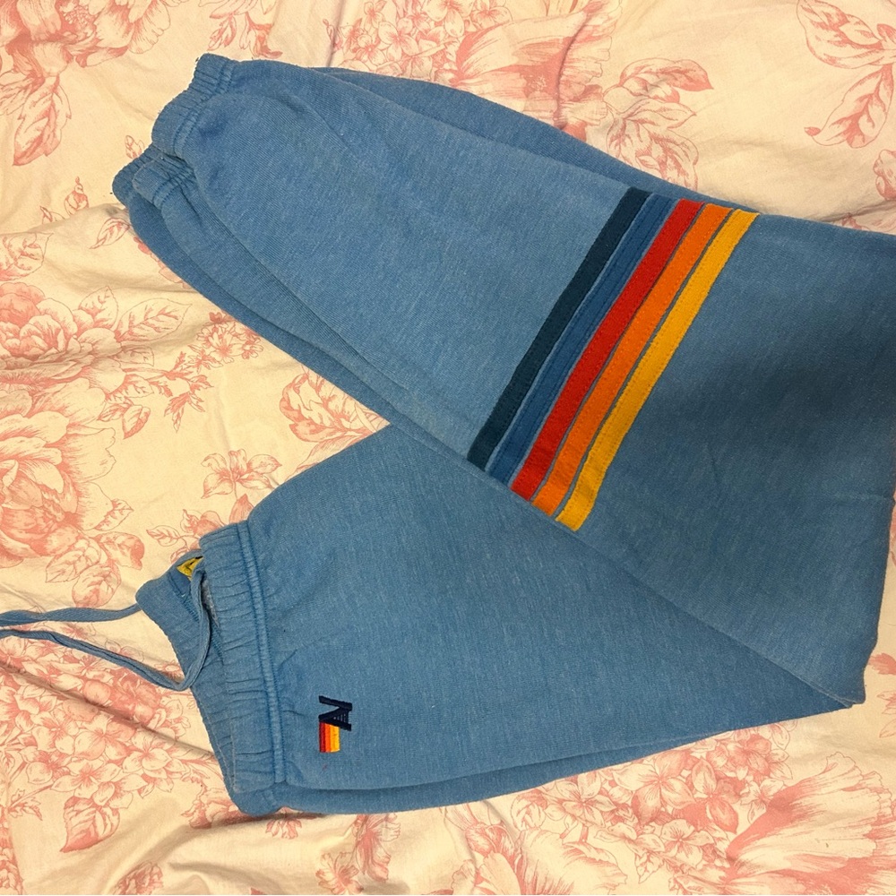 Aviator Nation Blue Track Pants with Rainbow Stripes